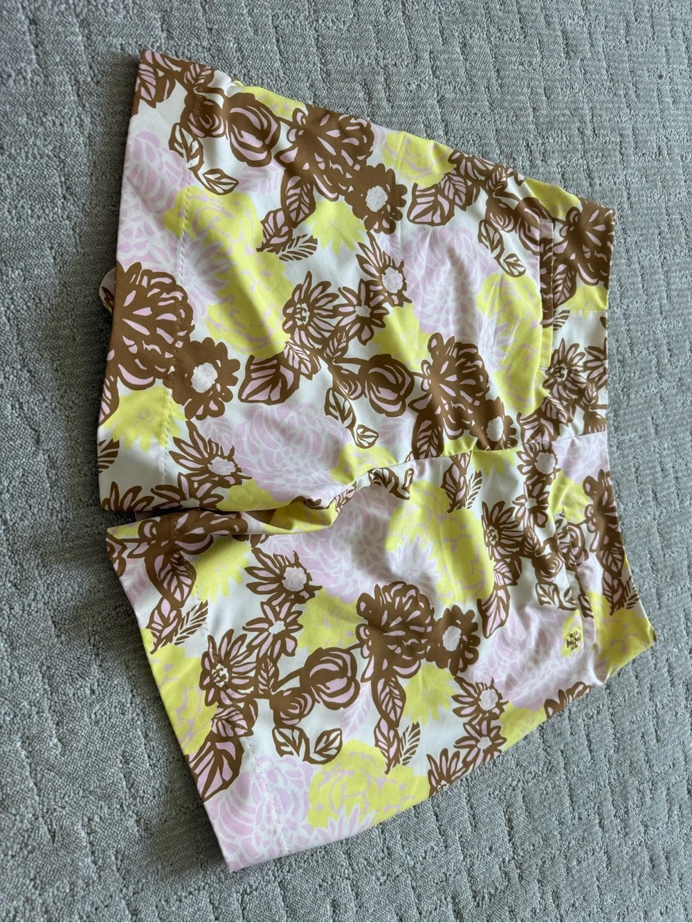 Tory Burch Tory Sport Printed Ruffle Golf Skort in French Crème Bouquet Pink